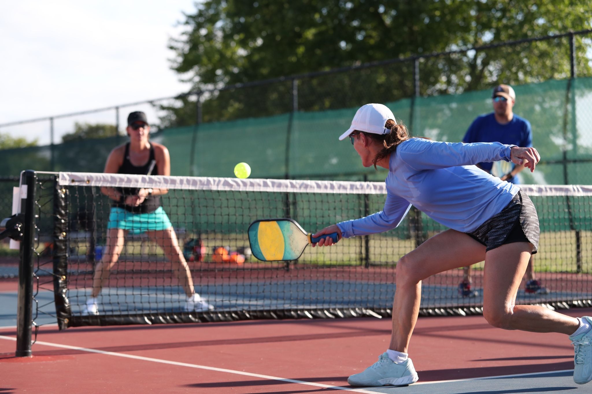 players playing pickleball on the court